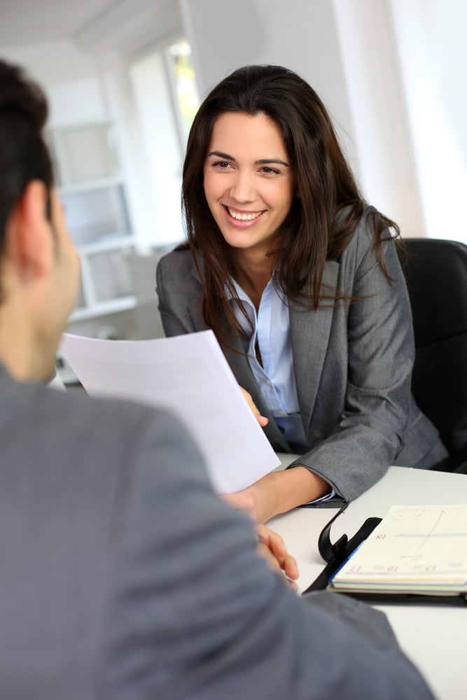 Businesswoman giving job interview